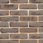 Декоративный кирпич Старый Питер Chocolate коричневого цвета с бежевой затиркой