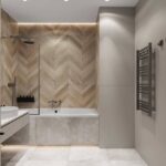 Керамогранит под паркет елочкой Hardwood nature фото в интерьере на стене