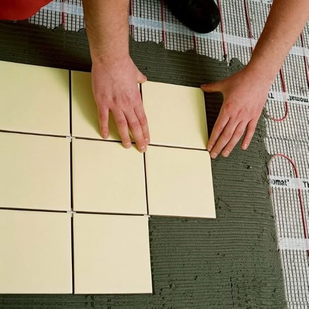 Плиточный клей для теплого пола